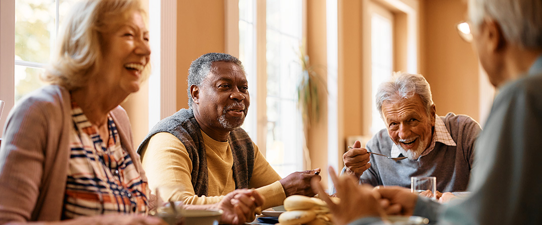 a group of seniors at a table